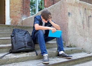 Sad Student with the Book