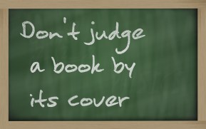 " Don't judge a book by its cover " written on a blackboard
