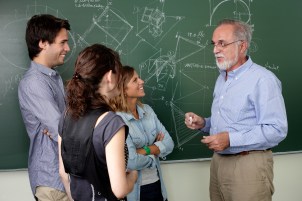 Teacher talking with students in the clasroom