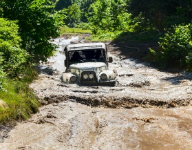 Off-road on difficult road after rain